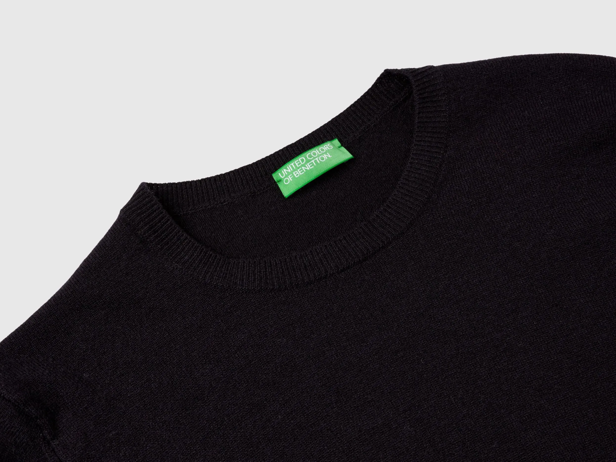 Black crew neck sweater in Merino wool - Black | Benetton